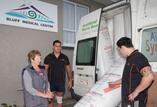Unloading insulation at the Bluff Medical Centre public building